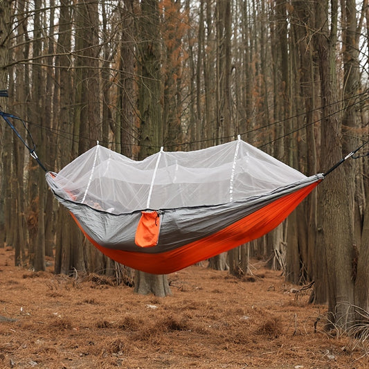 Dubbelhängmatta med antirullning och myggnät för camping utomhus och hemmabruk.